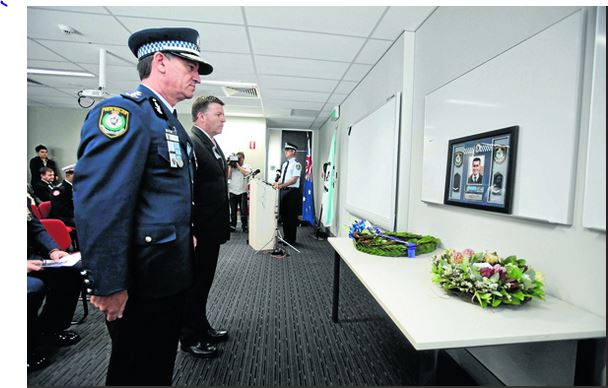 Minister for Police and Emergency Services, Michael Gallacher, and NSW Police Commissioner Andrew Scipione, pay their respects to slain local police officer, David Carty and Wednesday’s special memorial service in Sydney.