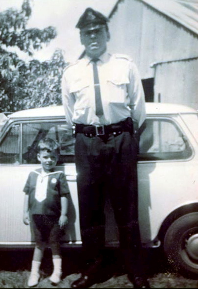 Sgt Harold James Evans with son Mark. Taken at West Wyalong, 1969 / 70. Photo courtesy of Virginia & Mark Evans.