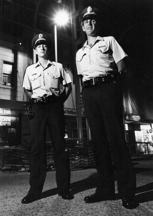 Constable Peter Dunn with Cst Jim Breeze in Wollongong Mall about 1984.