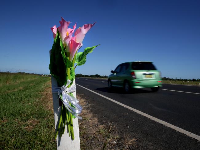 Flowers have been left at the scene of the fatal crash. Picture: Adam Head