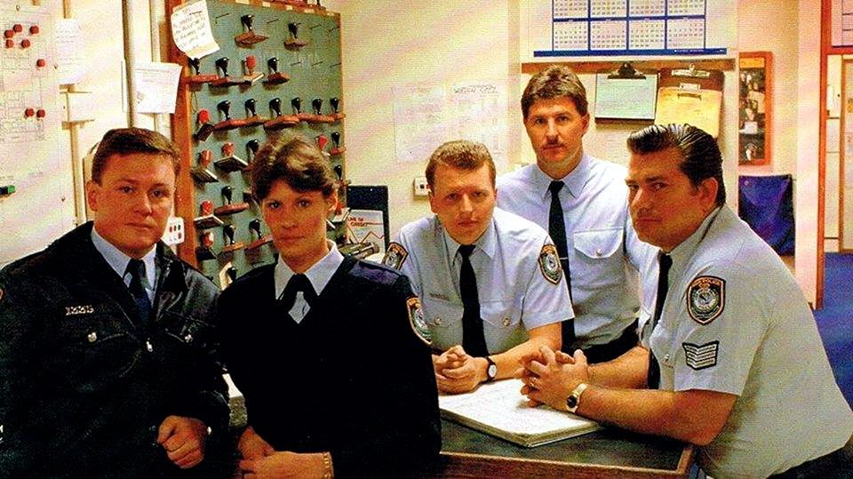 Robbie Gleeson # 23504, Cathy Poyner, Sean Johnson, Rick Senkowski # 22222 with Sgt 3/c Lenny HUXTABLE at Liverpool Police Stn.