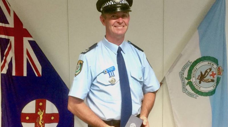 UNEXPECTED AND TRAGIC: Serving and retired police officers were among the mourners at the Dubbo funeral of Detective Senior Constable Peter Ensor who died in Fiji on April 4. Photo: Contributed