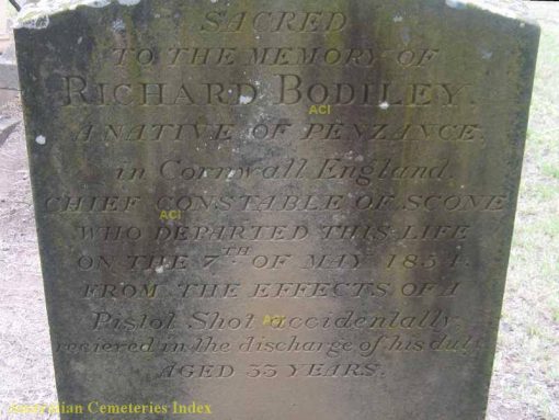 Inscription:Sacred to the memory of Richard BODLLEY, a native of Penzance, in Cornwall, England.Chief Constable of Scone, who departed this life on the 7th of May 1854, from the effects of a Pistol Shot accidentally recieved in the discharge of his duty.Aged 33 years.