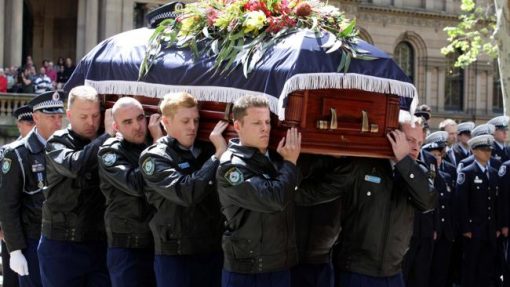  Police officers carry the coffin of Constable Bill Crews into St Andrews Cathedral in Sydney. Picture: Chris Pavlich 