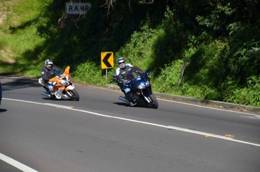 Gary J PEACOCK ( Orange bike ) & Ron JUDD riding up Bulli Pass, NSW on 7 May 2014.
