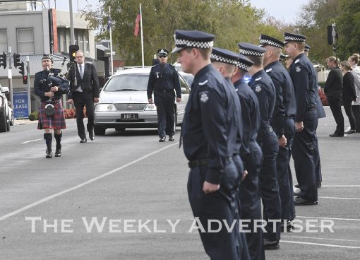 Police form a guard of honour for collegue Heath Martin in front of Horsham Police Station. - Heath MARTIN