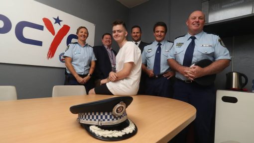 Aud JAEGER, Audra JAEGER, Audra Nicole JAEGER, Max Wilcox with Senior Constable Audra Jaeger, PCYC NSW chief executive Dominic Teakle, Superintendent Mark Wall, Assistant Commissioner Joe Cassar and Superintendent Dean Smith. Picture: Robert Peet Illawarra Mercury 20/12/2019