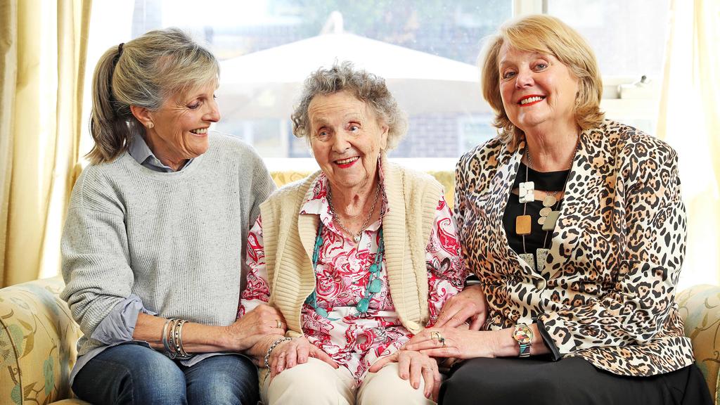 Yvonne Tupman, who recently turned 100 years old, was one of the first women in policing in NSW. She is pictured with her daughters Lyn and Robyn. Picture: Tim Hunter